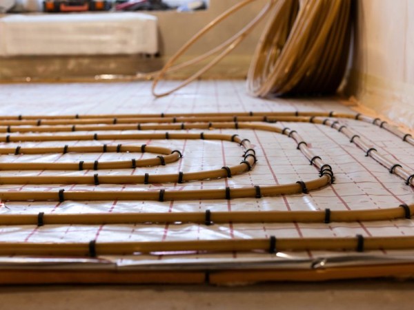 Isolation projetée sol et chauffage sol 